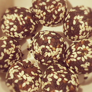  Chocolate Date Balls Covered in Sesame Seeds